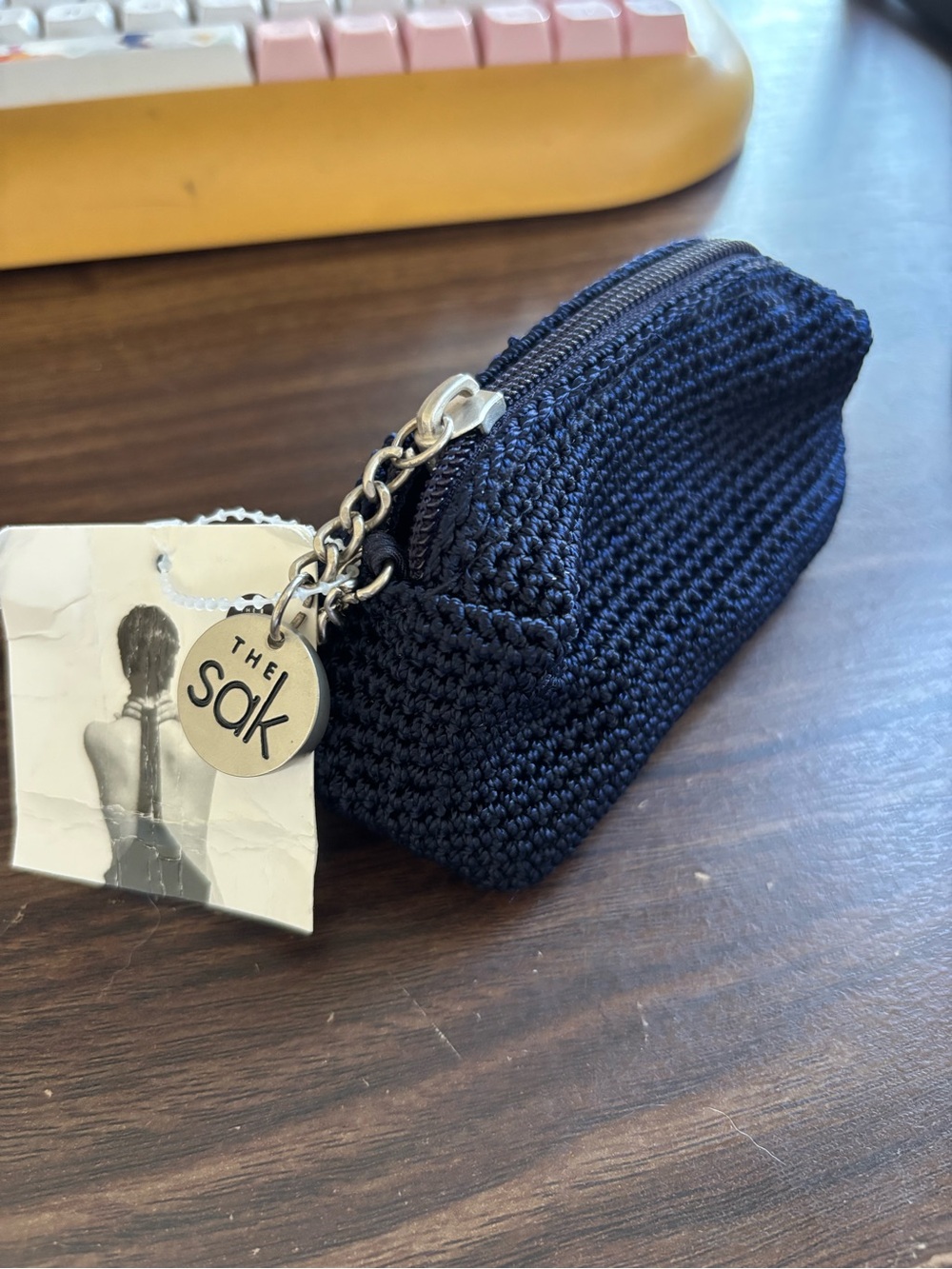 Navy Blue The Sak mini coin purse can be used as a cute little keychain or coin